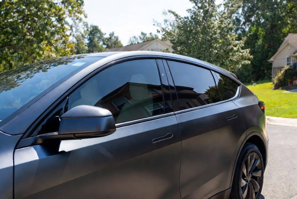 Dark SUV with professional window tint for privacy and style in Chantilly Virginia