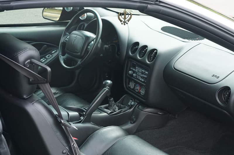 2002 Pontiac Trans AM Restoration Detail - Interior looking at drivers seat with fresh coat of GYEON Protection applied from Tabula Rasa Auto Detailing