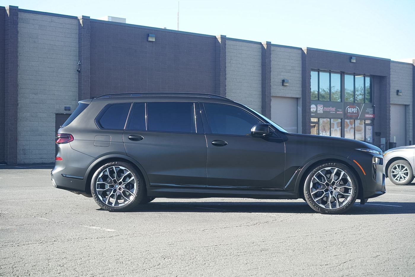 BMW X7 side profile in matte black PPF